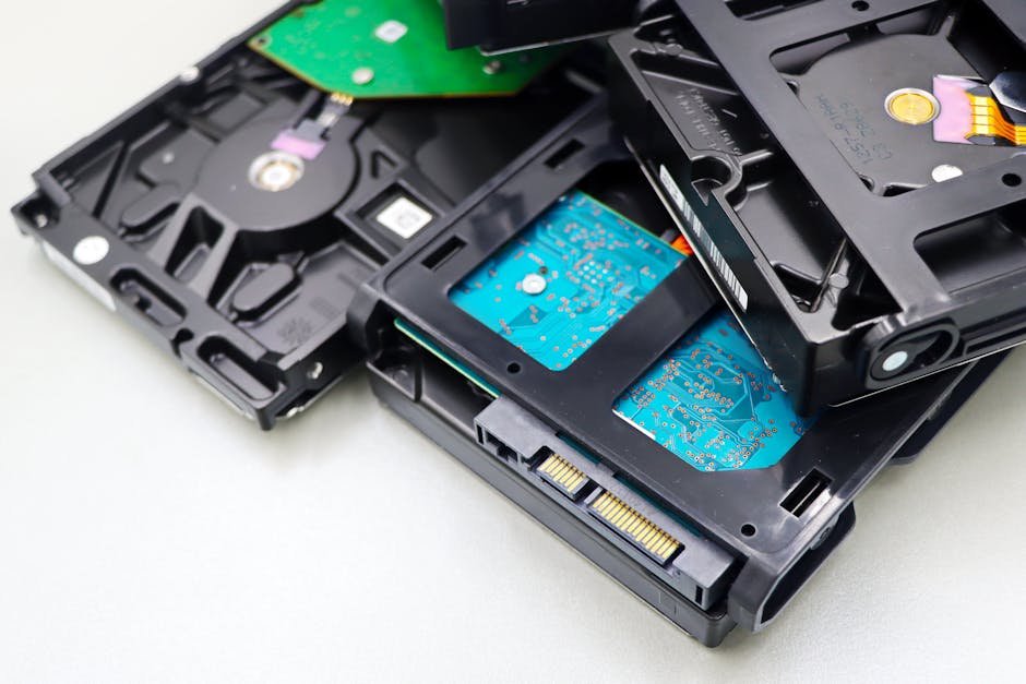 Stack of internal hard disk drives representing backup storage