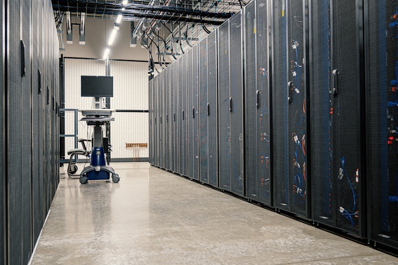 GPU server racks in a data center for RunPod and Vast.ai cloud computing comparison